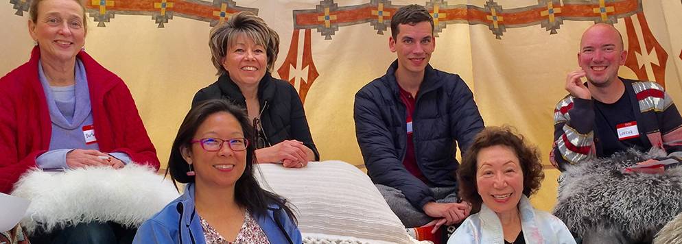 Dr Michiyo with Group inside of tee pee Dr Michiyo with Group inside of tee pee