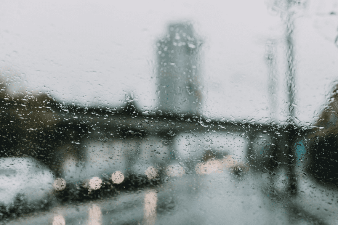 View of rainy street outside of window